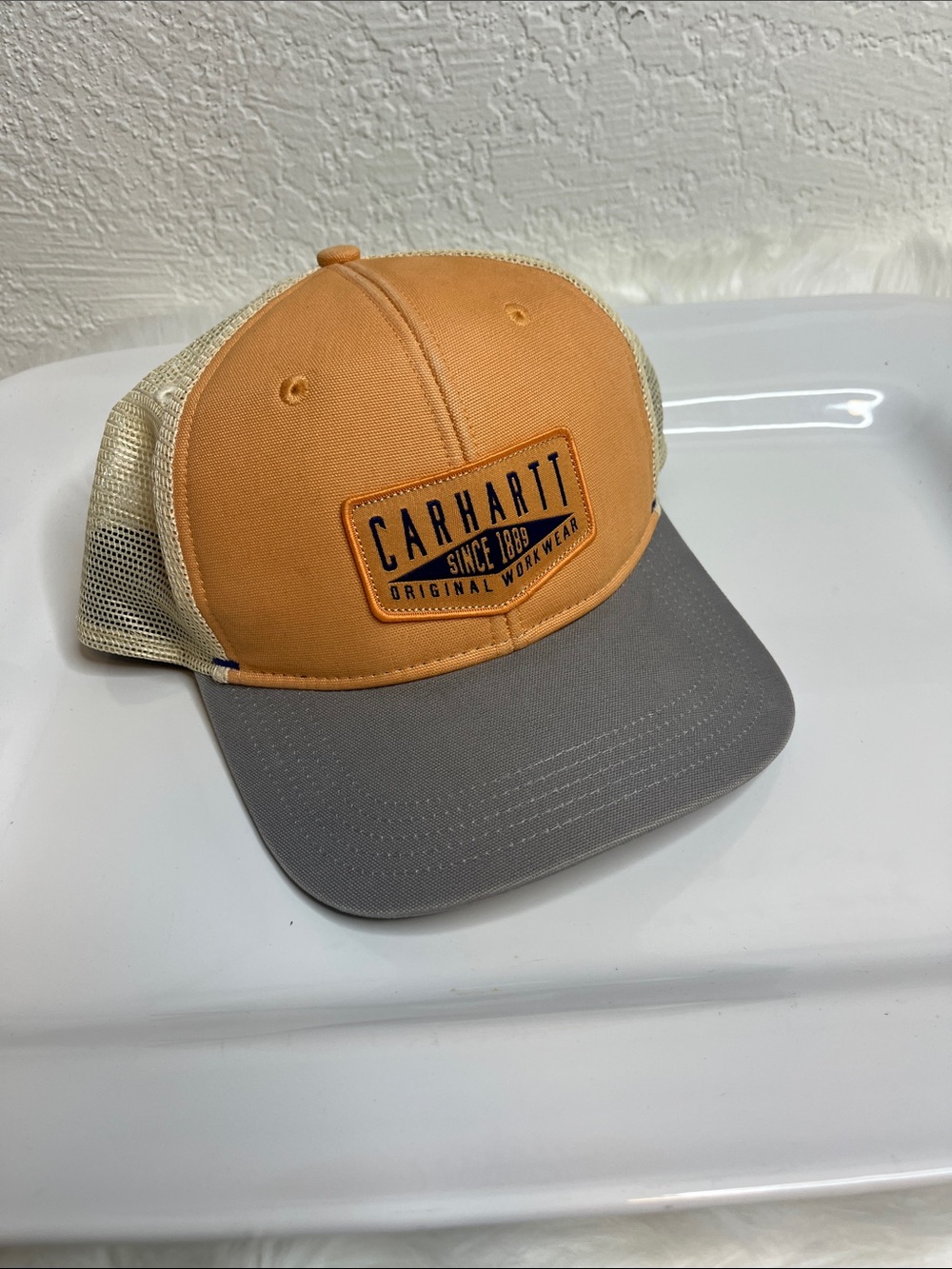 Carhartt Peach Front Trucker Hat with Gray Bill